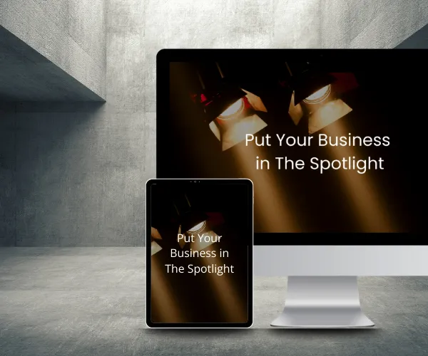 An iPad standing next to a Mac computer